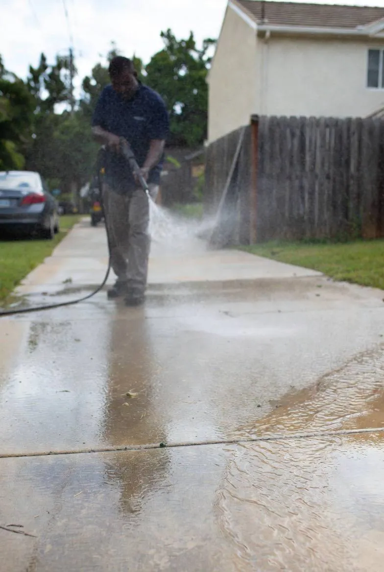 Concrete driveway professionally pressure washed