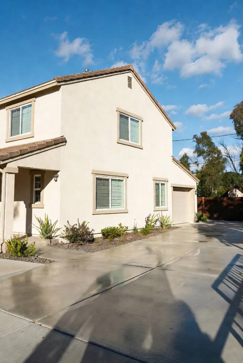 Concrete driveway pressure washed -- Rochester NH
